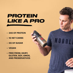 TB12 vanilla protein shake in blender bottle for post-workout recovery.