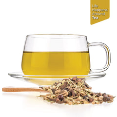 Tealyra Blood Cleanser Tea brew in cup showing an amber infusion ready to enjoy.