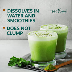 Teaveli barley grass juice powder in a glass reveals vibrant green freshness.