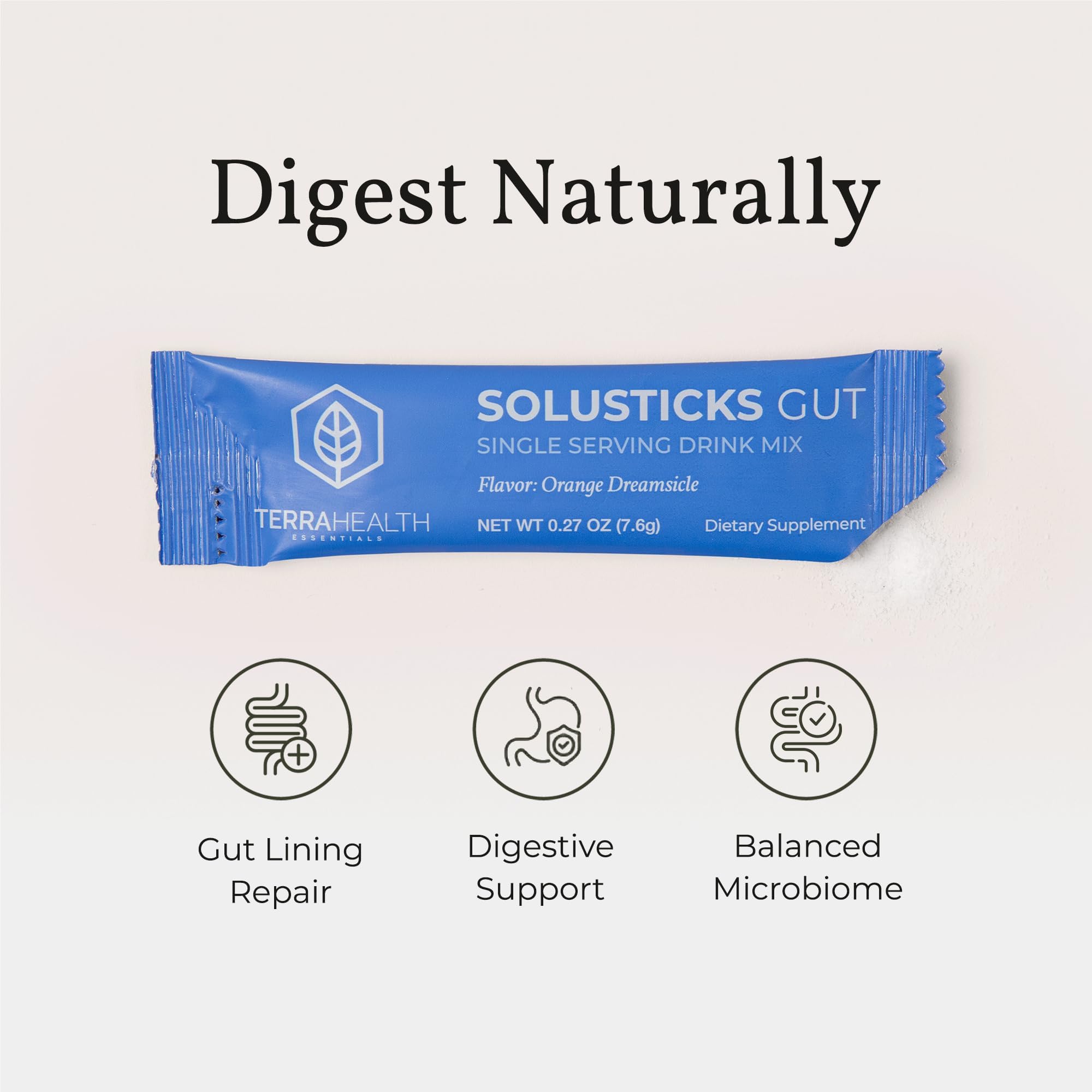 Terra Health Essentials Solusticks Gut on a counter with portable pack for easy daily use.