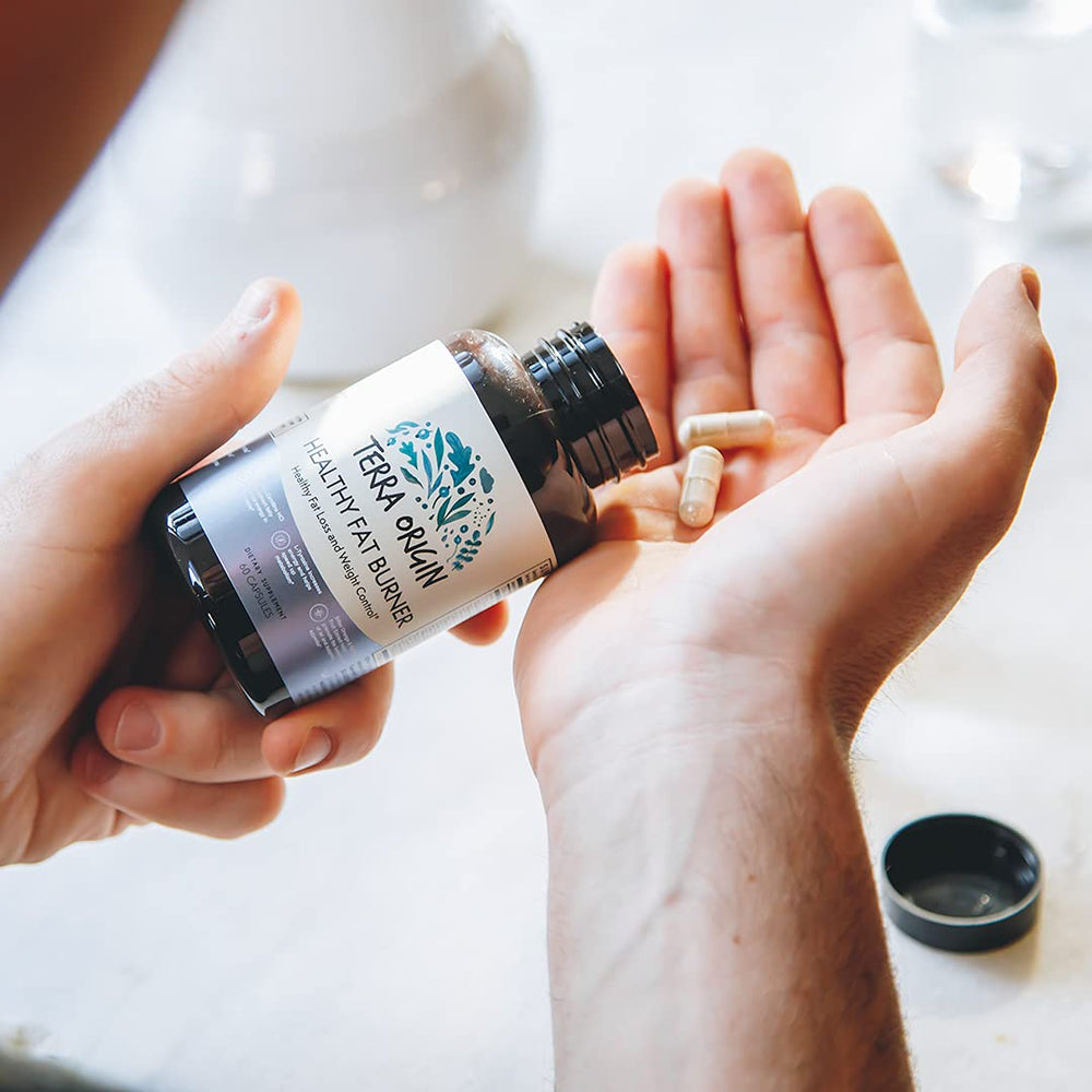 Terra Origin metabolism capsules on kitchen counter signaling routine support.