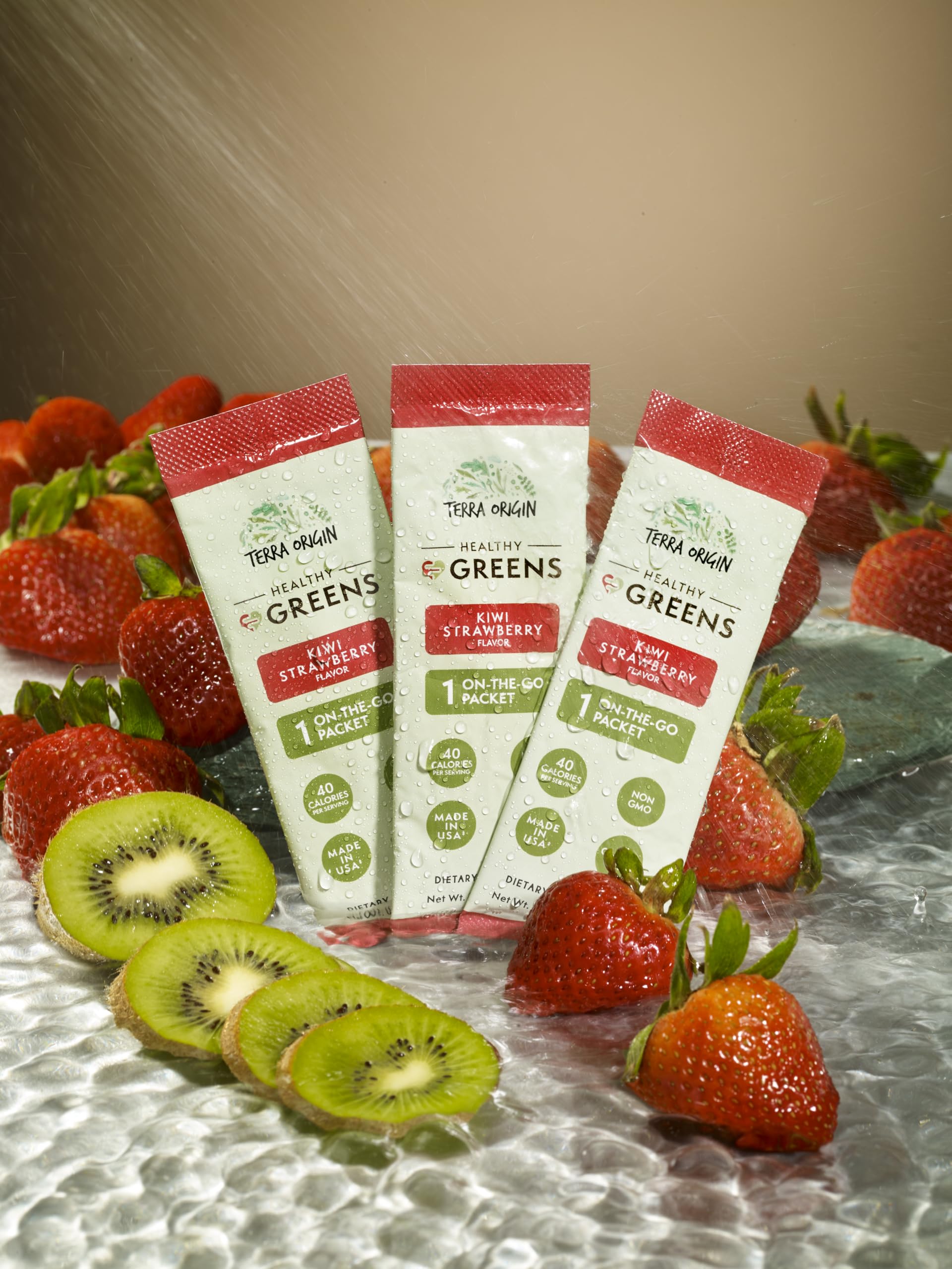 Terra Origin greens packets on-the-go beside a gym bottle for quick nutrition.