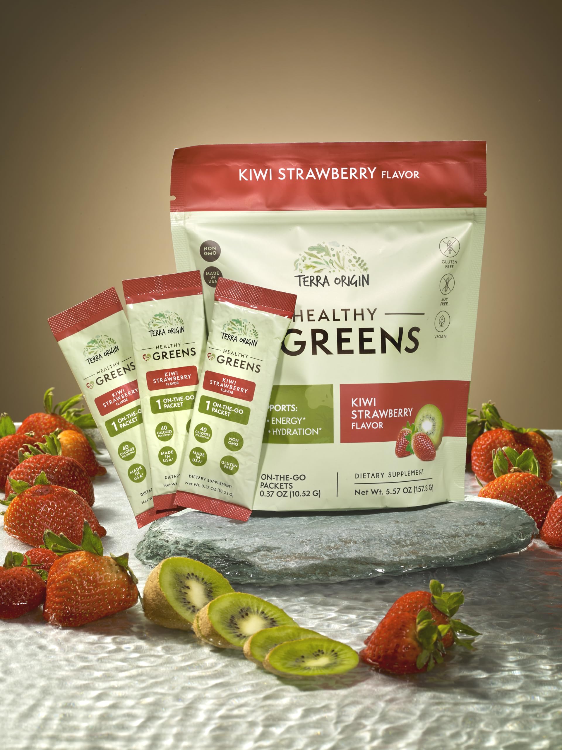 Terra Origin greens packets being poured into a glass for a refreshing energy drink.