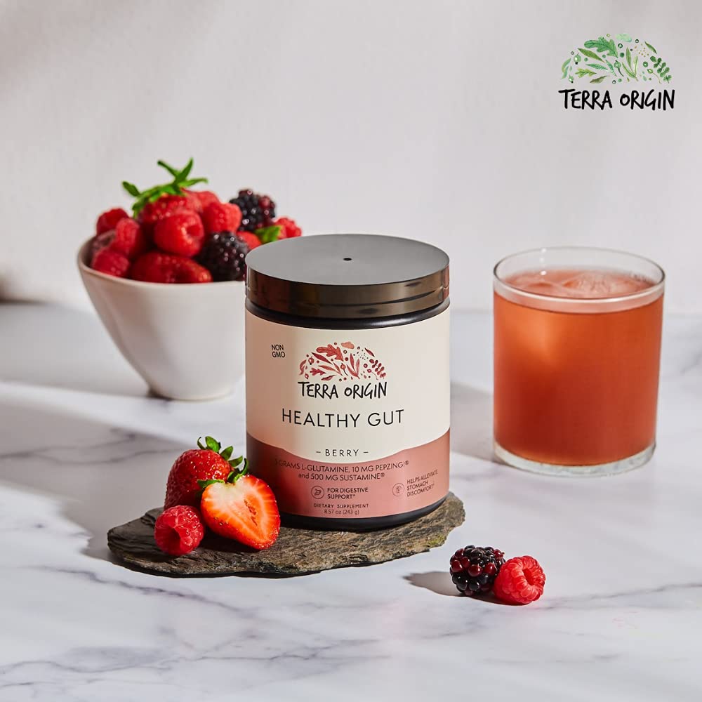 Close-up of Terra Origin Healthy Gut Powder in a glass with berry look