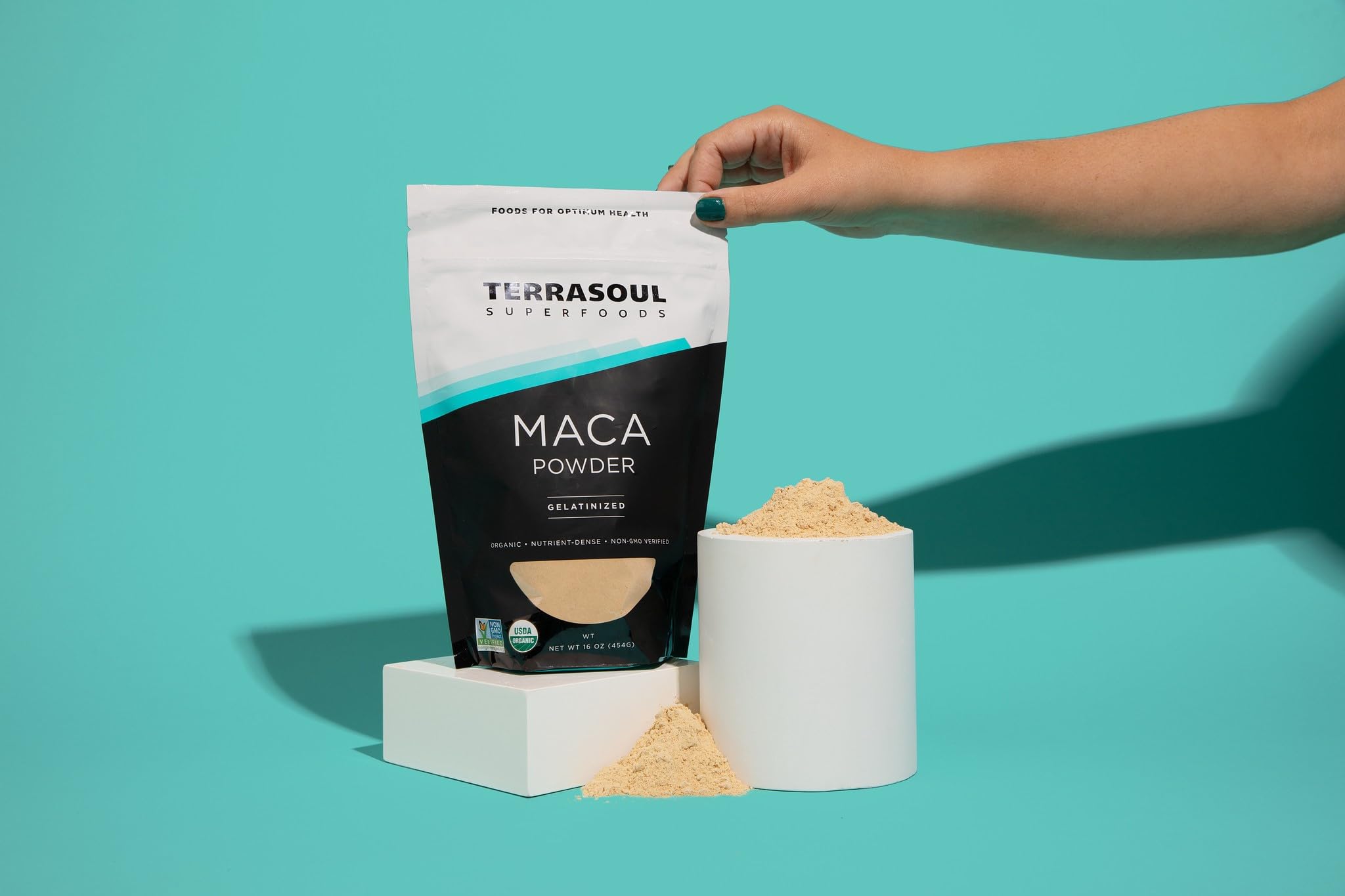 Terrasoul maca powder dissolving in liquid for fast, smooth beverages.