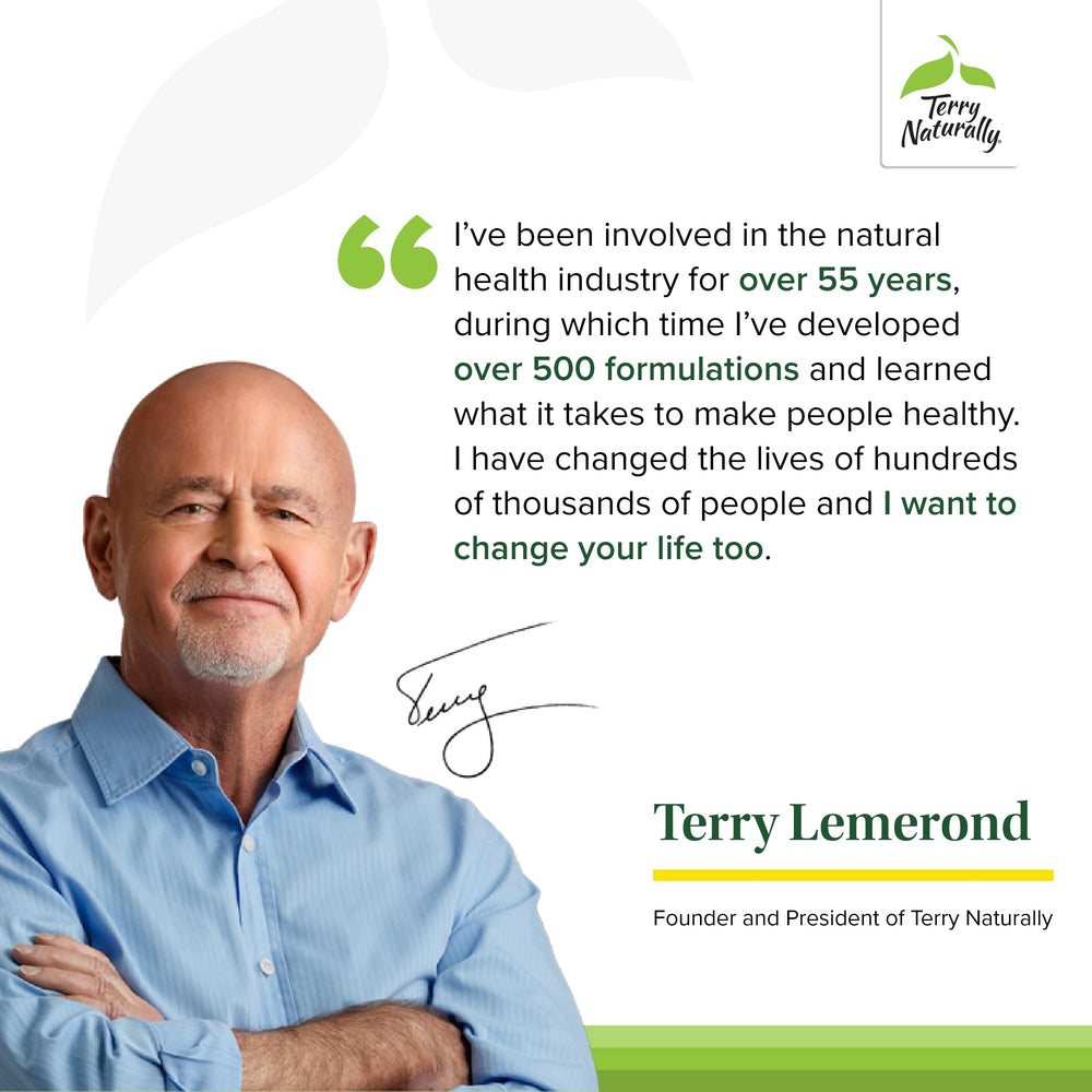 A person uses Terry Naturally Adrenaplex at a desk for steady energy and focus.