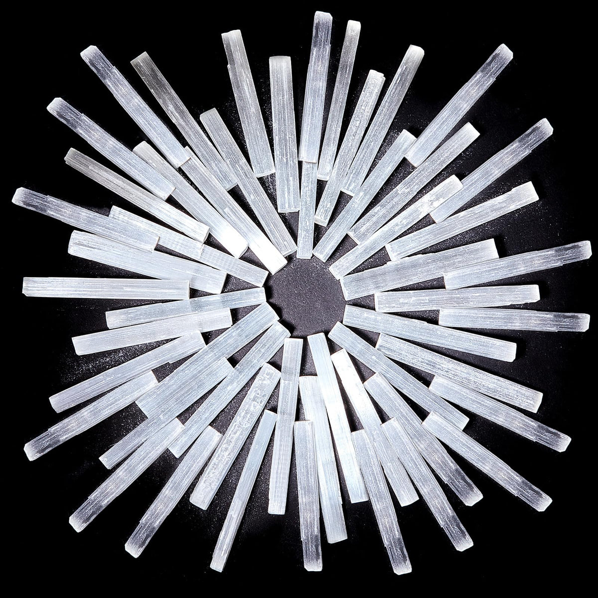 Tessco for you selenite wand closeup highlighting pure white crystal energy