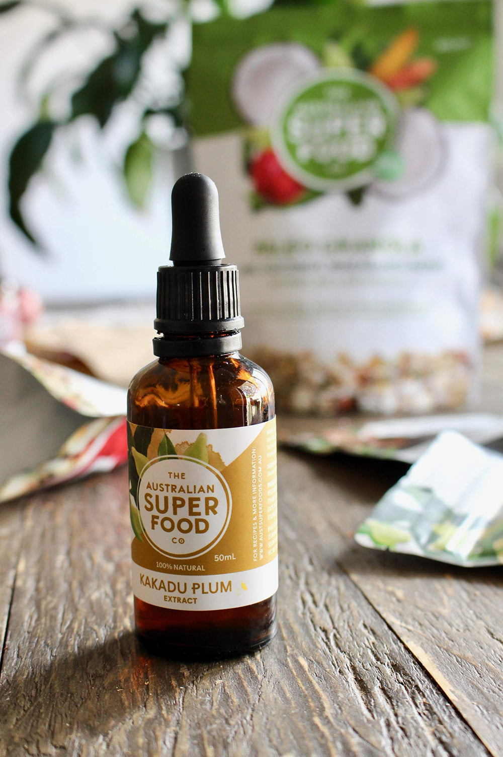 Pouring Kakadu Plum Extract into a glass enhances tart aroma and flavor
