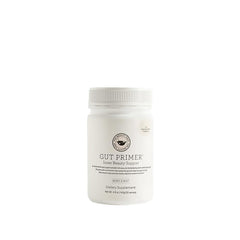 The Beauty Chef Gut Primer bottle front showing berry-mint flavor for digestive comfort.