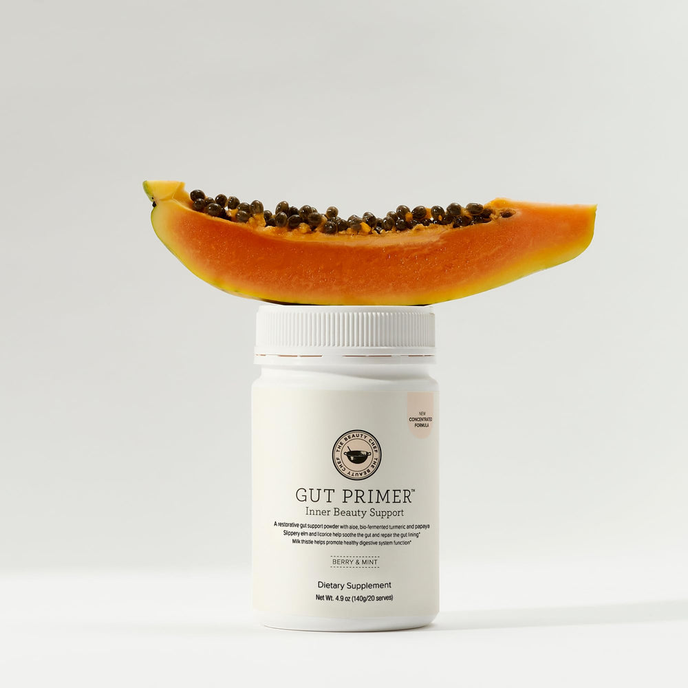 The Beauty Chef Gut Primer bottle side highlighting bio-fermented formula for gut health support.