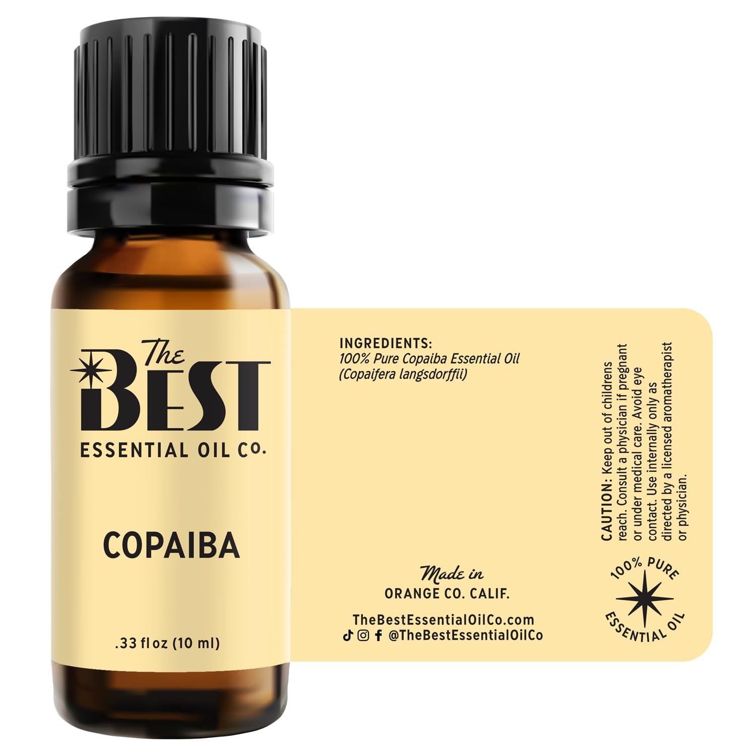 The Best Essential Oil Co Copaiba bottle label shows premium grade.