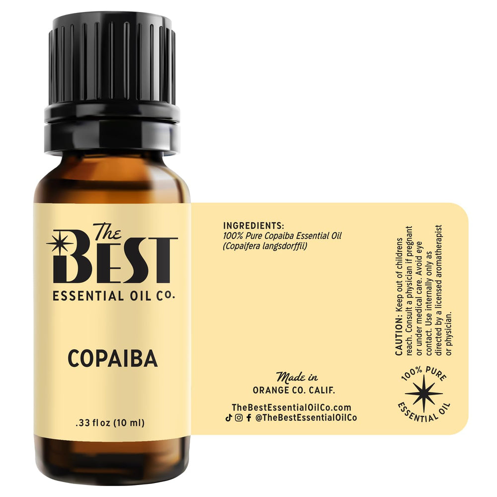 The Best Essential Oil Co Copaiba bottle label shows premium grade.