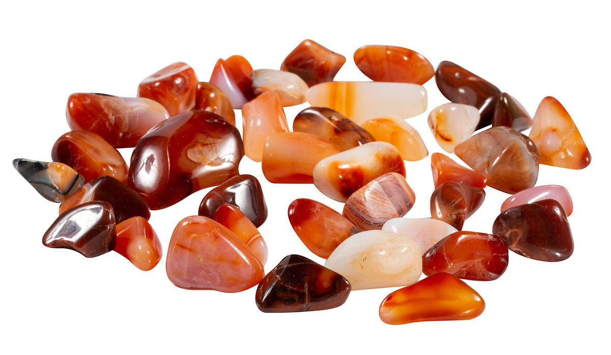 The Chrysalis Stone carnelian tumbled stones in a warm color palette for energy and focus