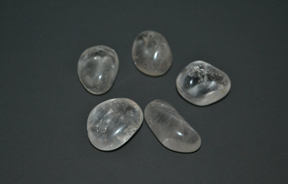 The Chrysalis Stone Clear Quartz tumbled stone showcases natural sparkle for focus and energy balance.