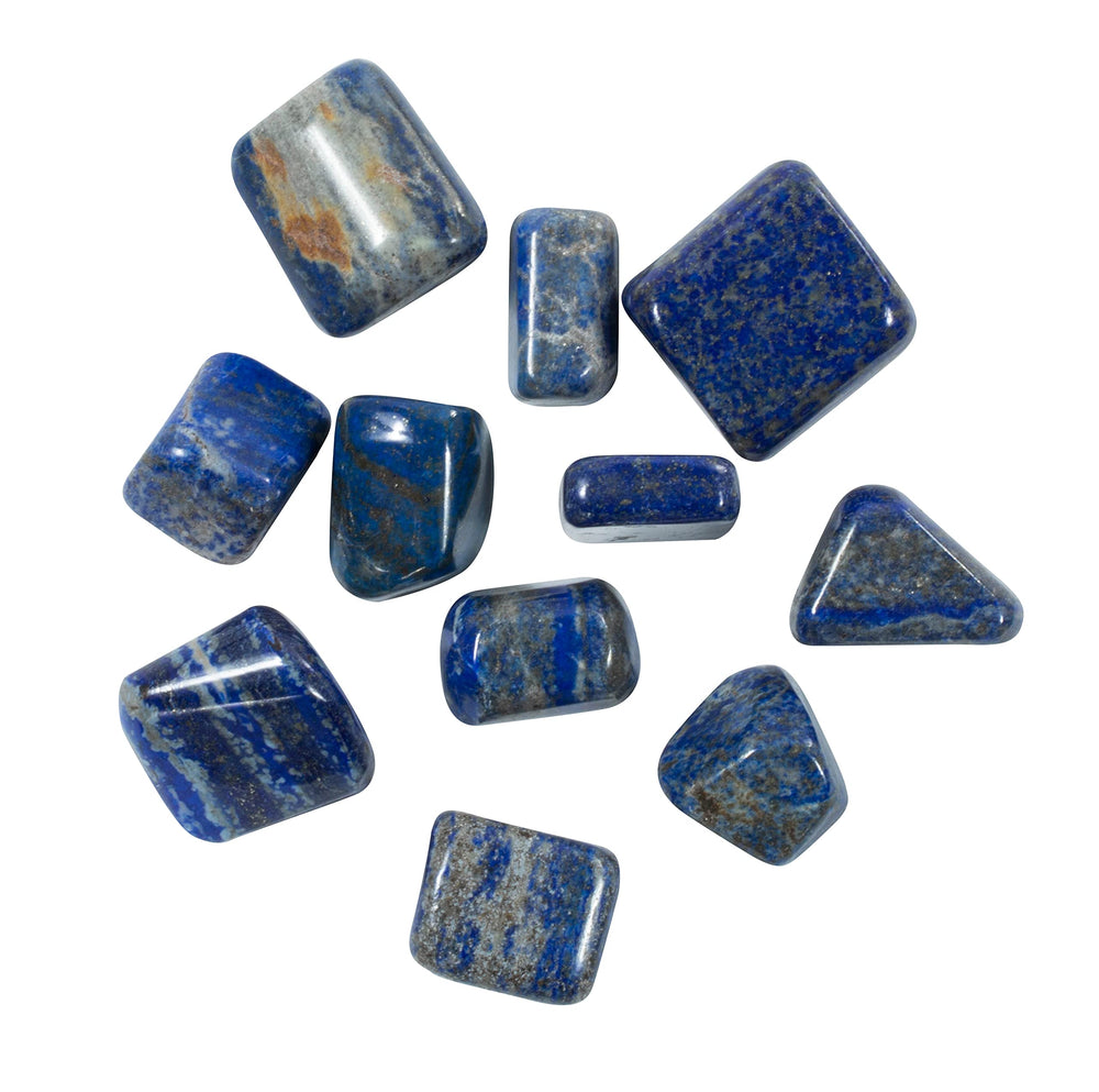 The Chrysalis Stone lapis lazuli tumbled stone in hand for scale and tactile feel.