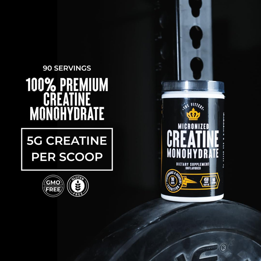 The Fittest Ever creatine scoop beside glass, supports steady energy during workouts