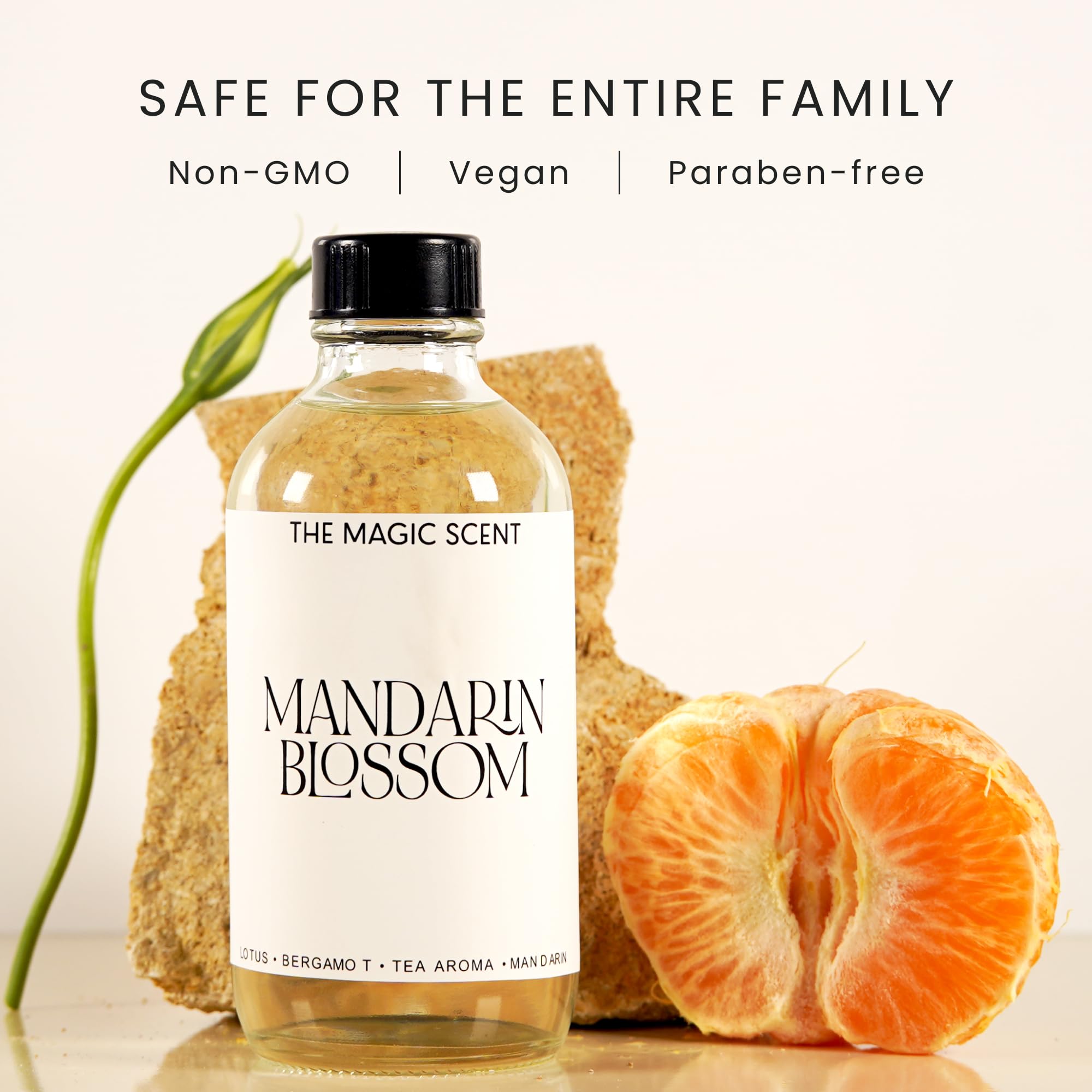 The Magic Scent Mandarin Blossom bottle being poured, ideal for room fragrance updates