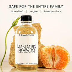The Magic Scent Mandarin Blossom bottle being poured, ideal for room fragrance updates