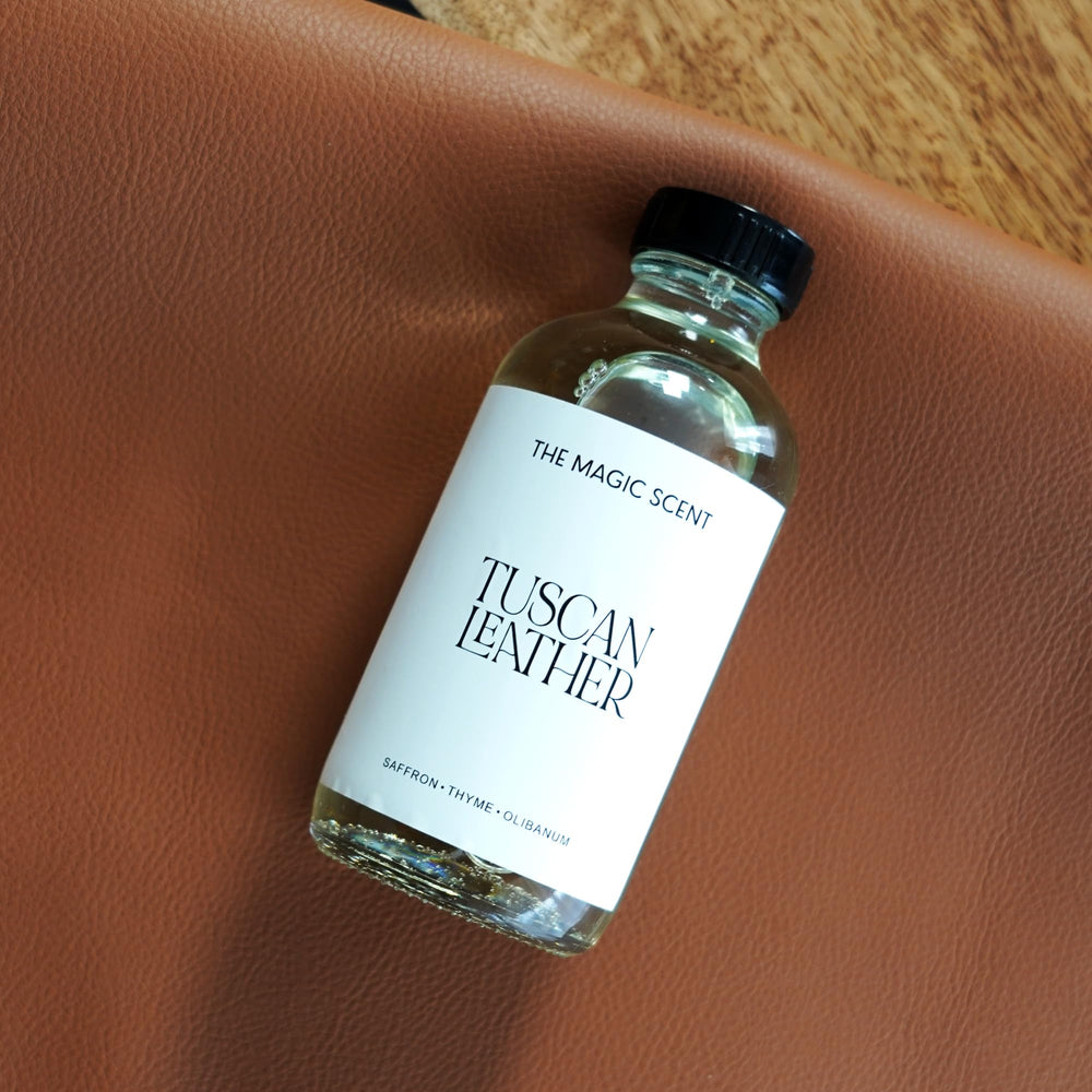 Leather texture note evokes luxury in home scent.
