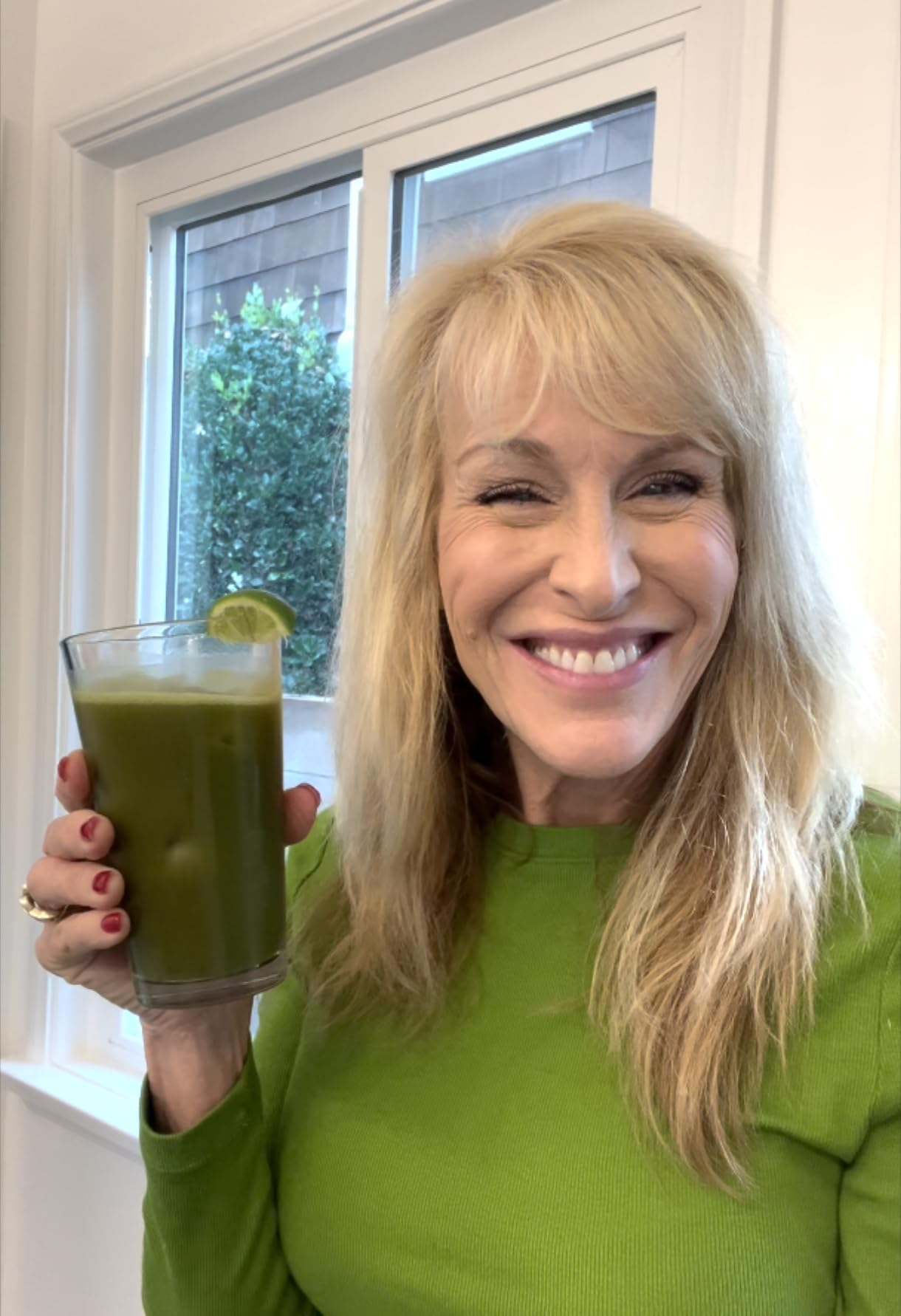 The Nerve Brand Neuropathy Superfood Blend spoon-dipping into smoothie highlights flavor