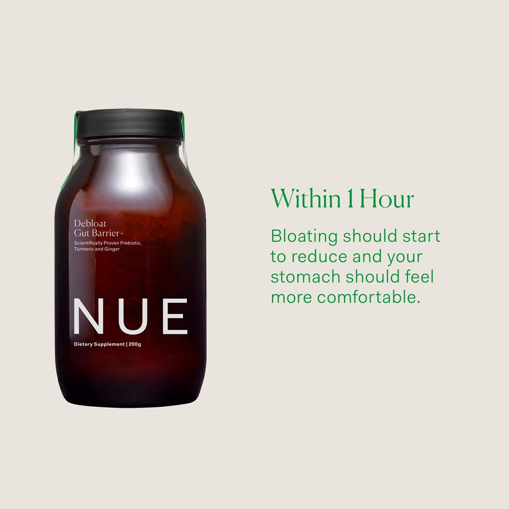 The Nue Co Debloat turmeric-ginger blend bottle emphasizes natural digestive comfort.
