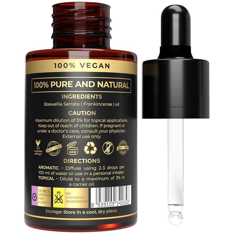 The Organic Forest frankincense oil dropper beside a diffuser for diffusion