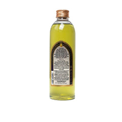 The Peace of God frankincense, myrrh, spikenard oil bottle closeup enhances sacred space during worship.