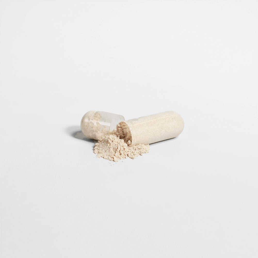 The Real Tonic capsules closeup emphasizes convenient two-capsule daily nourishment for vitality.