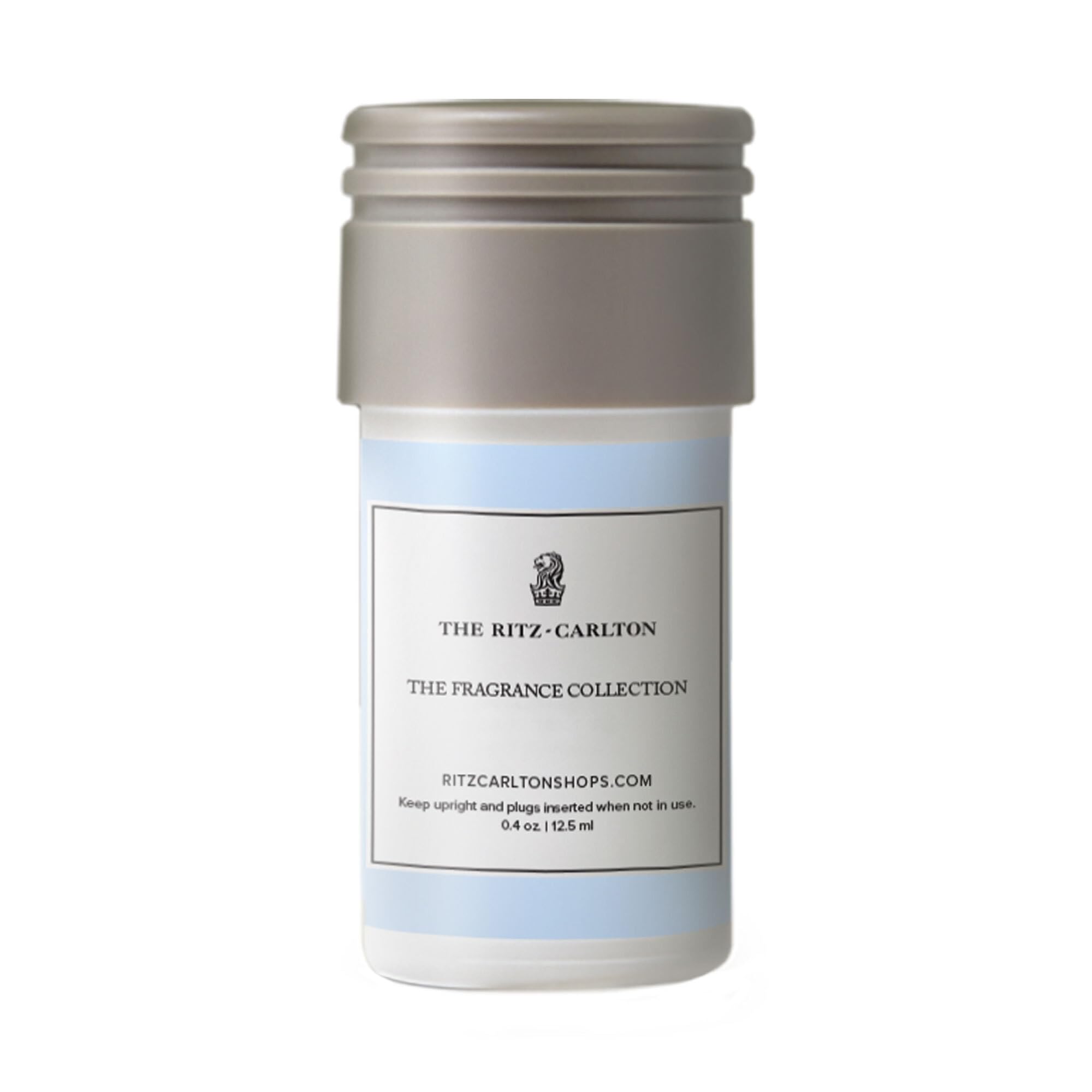The Ritz-Carlton mini diffuser refill with gardenia and tiare for long-lasting fragrance.
