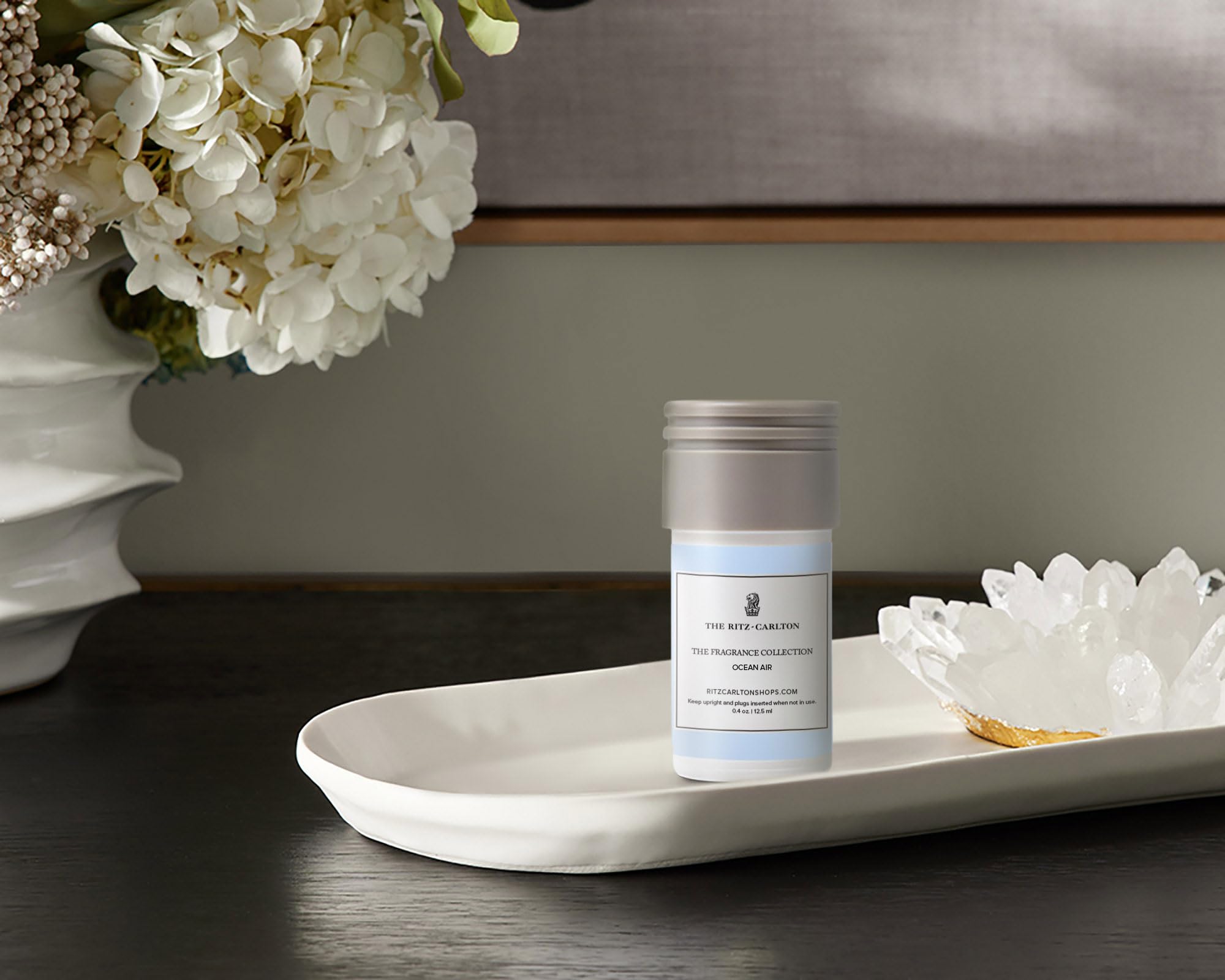 The Ritz-Carlton mini diffuser refill featuring lily of the valley and sandalwood for calm spaces.