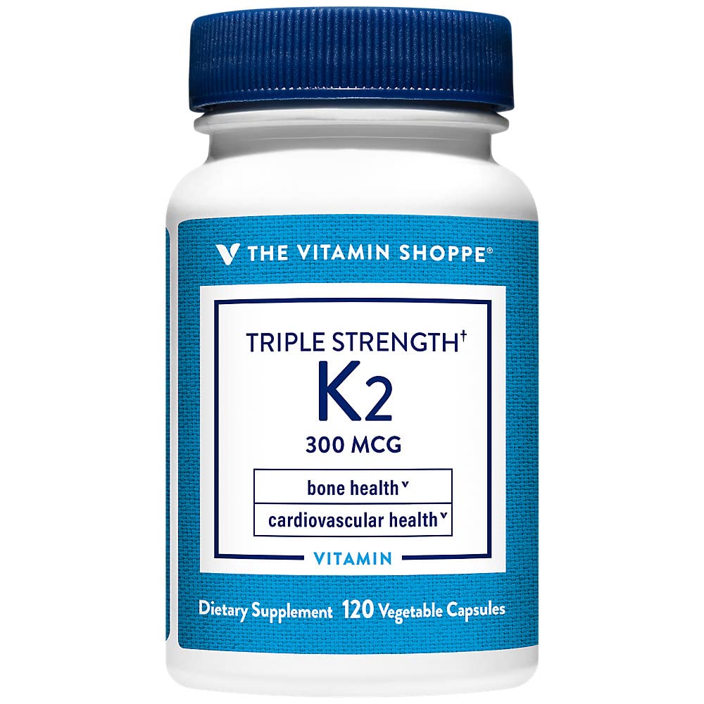 The Vitamin Shoppe Vitamin K2 MK-7 bottle highlights 120 vegetable capsules for bone and heart health.