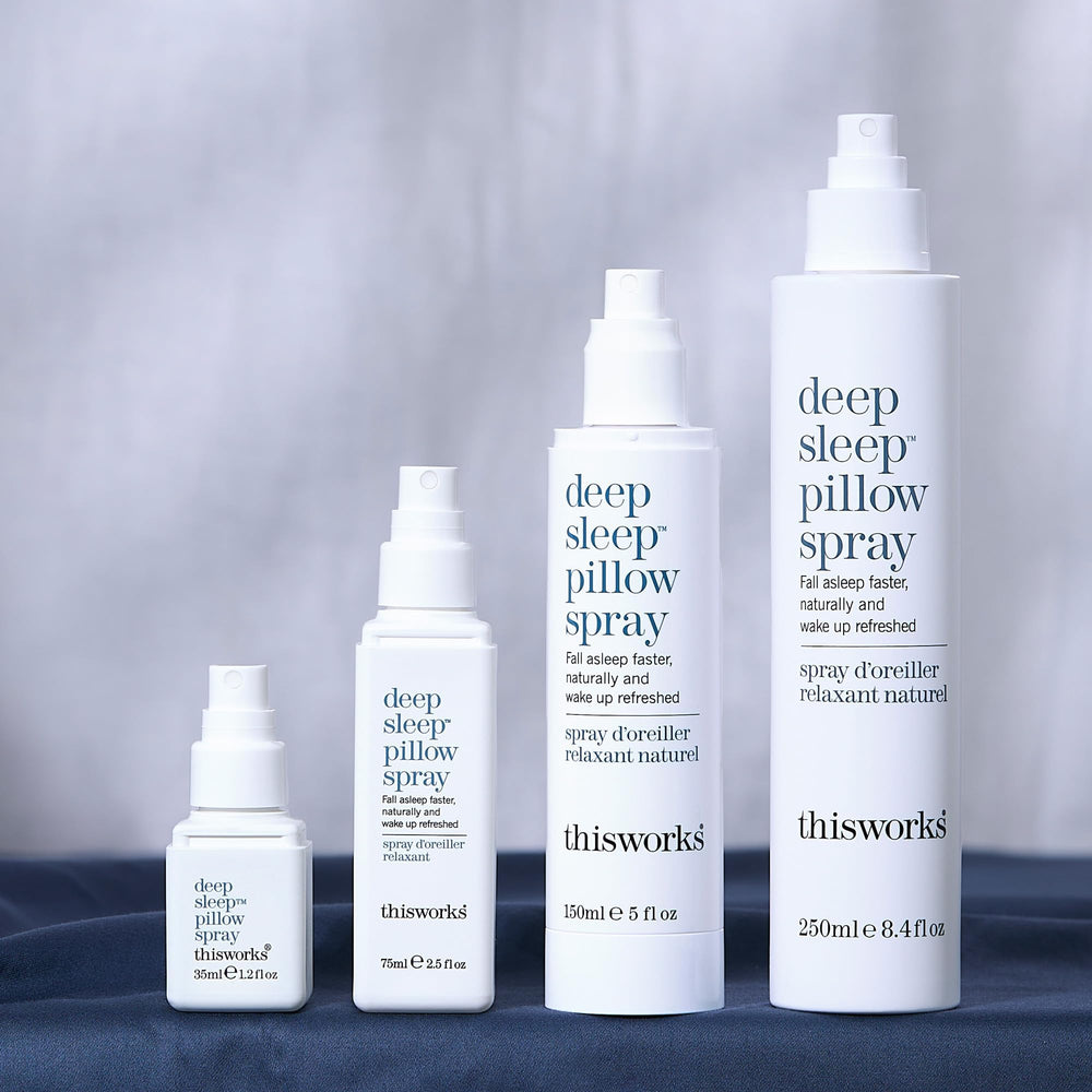 Bedroom scene with THISWORKS spray ready for essential-oil inspired nights
