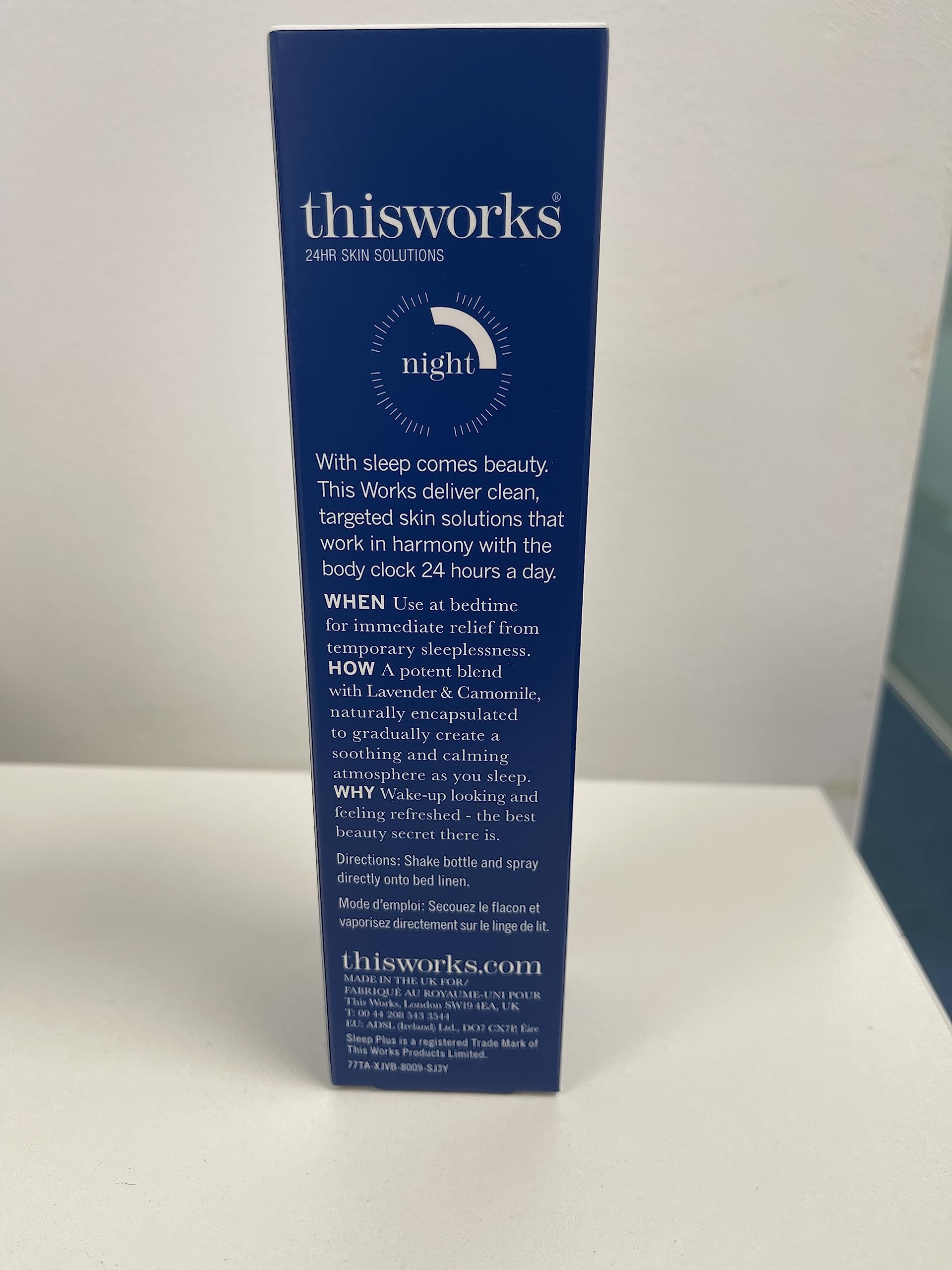 THISWORKS Sleep Plus Pillow Spray bottle highlights essential oil blend.