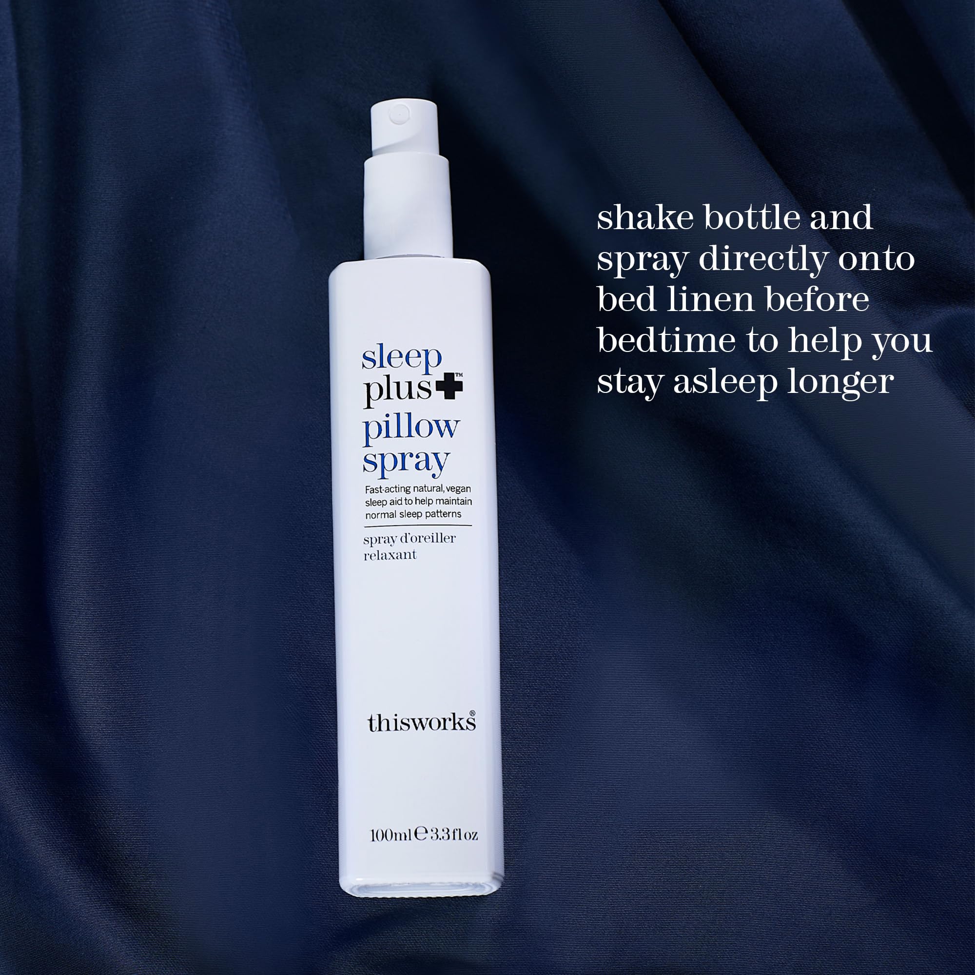 THISWORKS Sleep Plus Pillow Spray beside pajamas for bedtime routine.