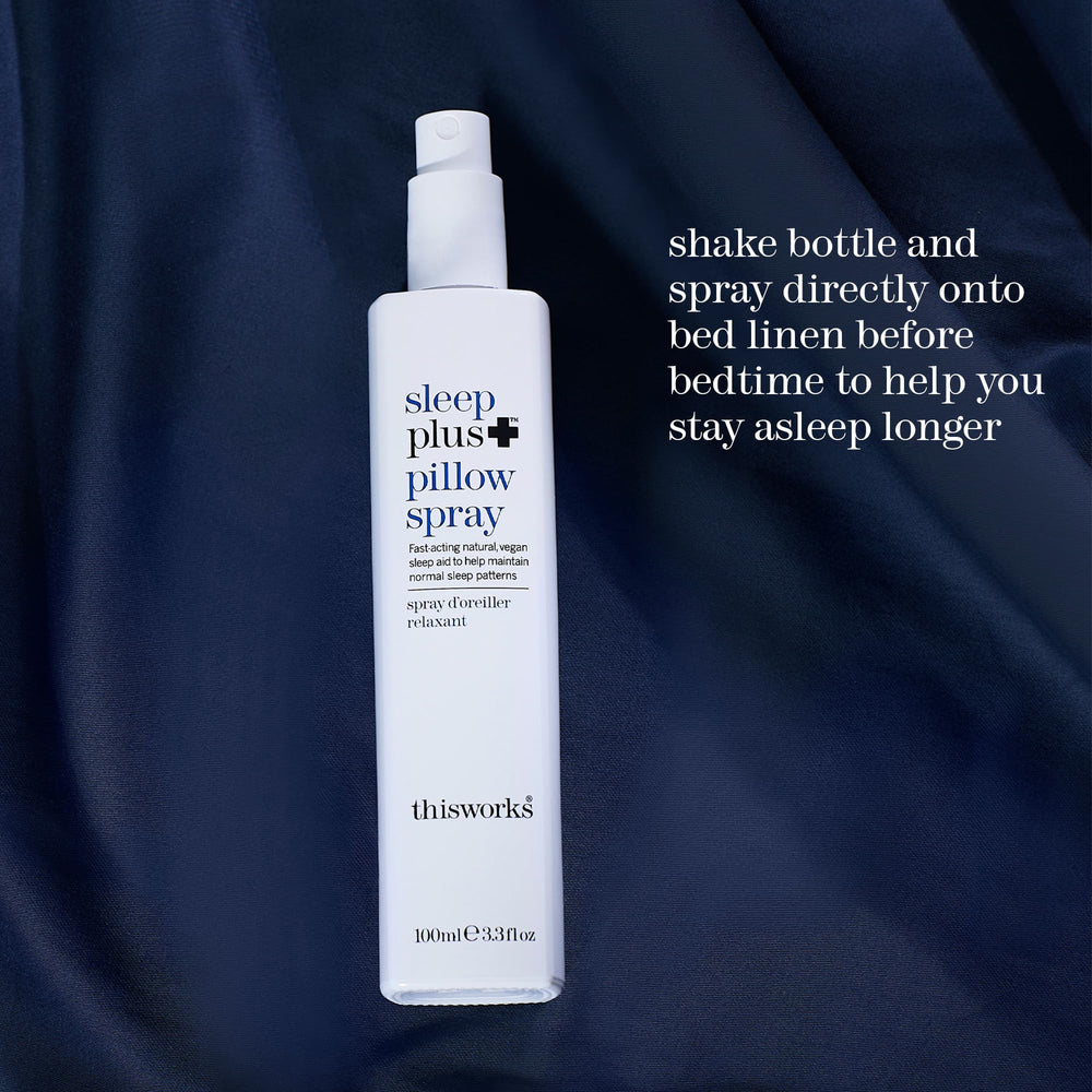 THISWORKS Sleep Plus Pillow Spray beside pajamas for bedtime routine.