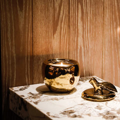 Thompson Ferrier 40oz jar candle offers long burn time for cozy evenings.