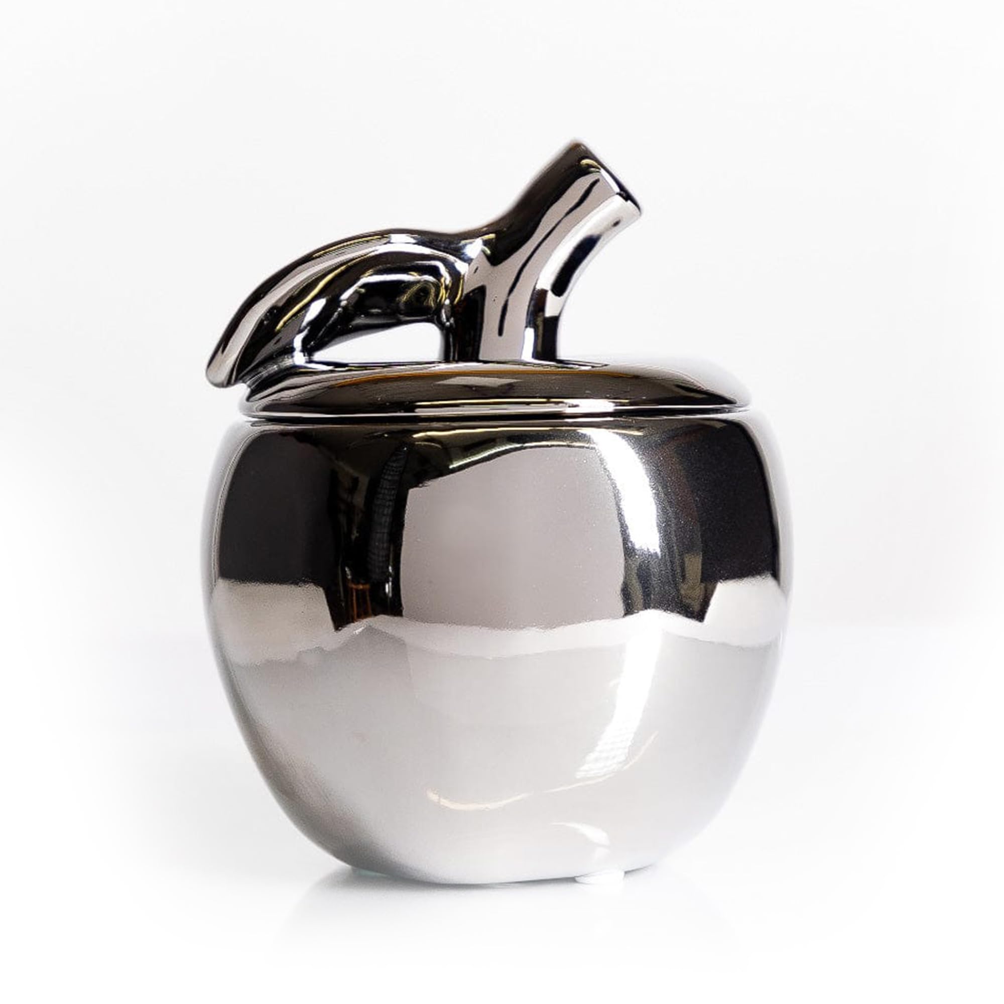 Thompson Ferrier Apple Candle in a silver ceramic jar as a centerpiece with long burn