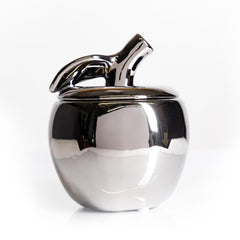 Thompson Ferrier Apple Candle in a silver ceramic jar as a centerpiece with long burn
