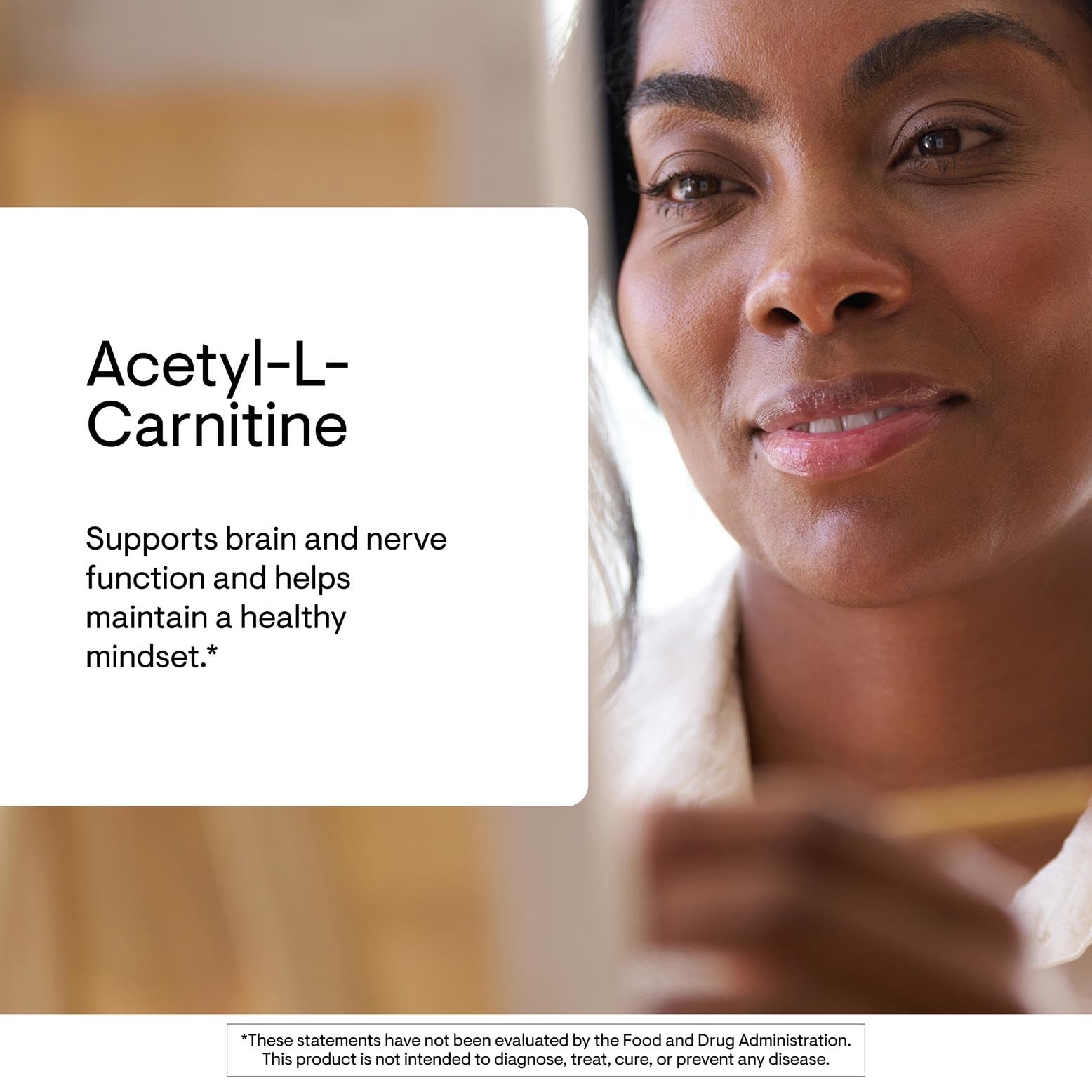 THORNE Acetyl-L-Carnitine 500 mg capsules closeup showing smooth texture