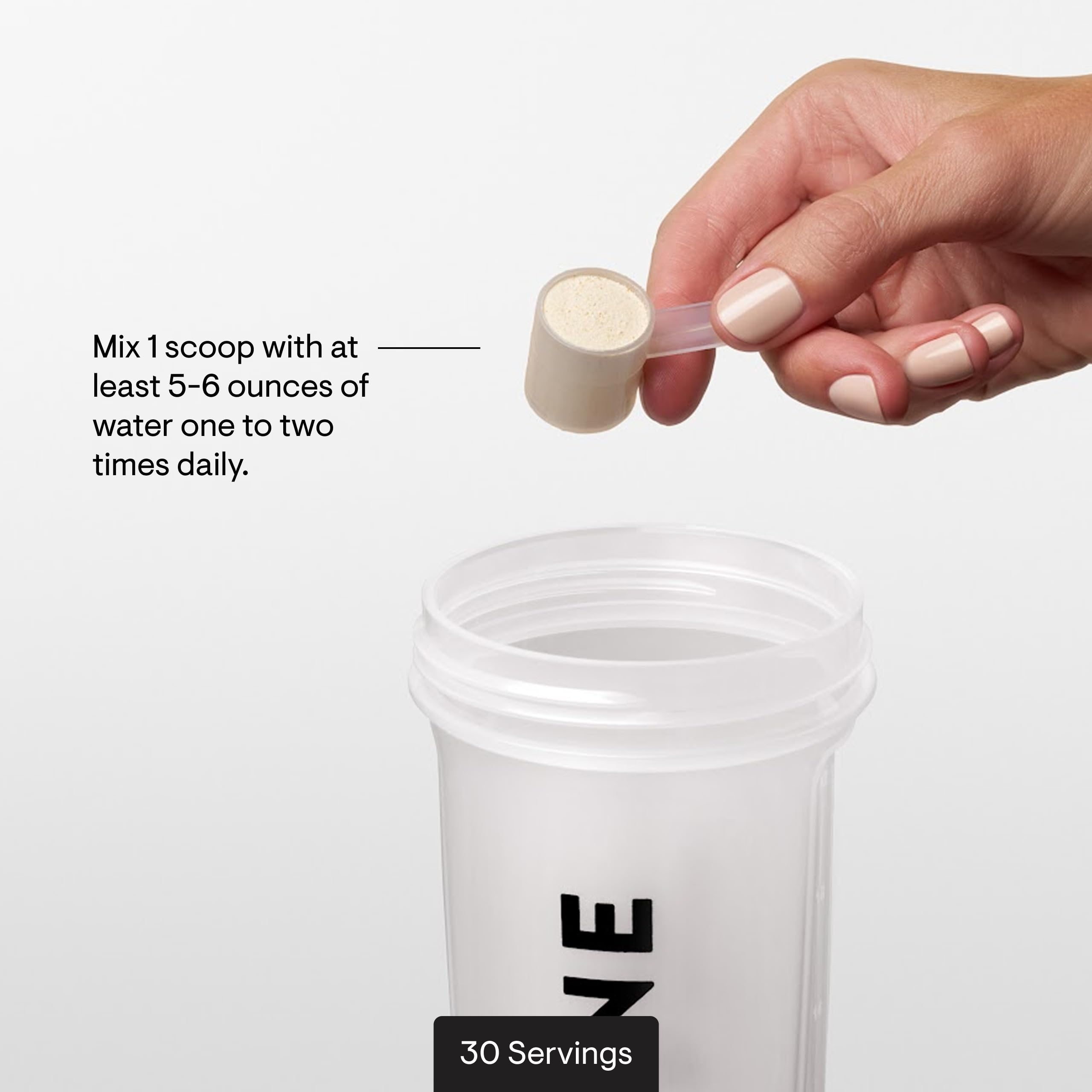 Thorne EnteroMend bottle beside glass for easy daily intake