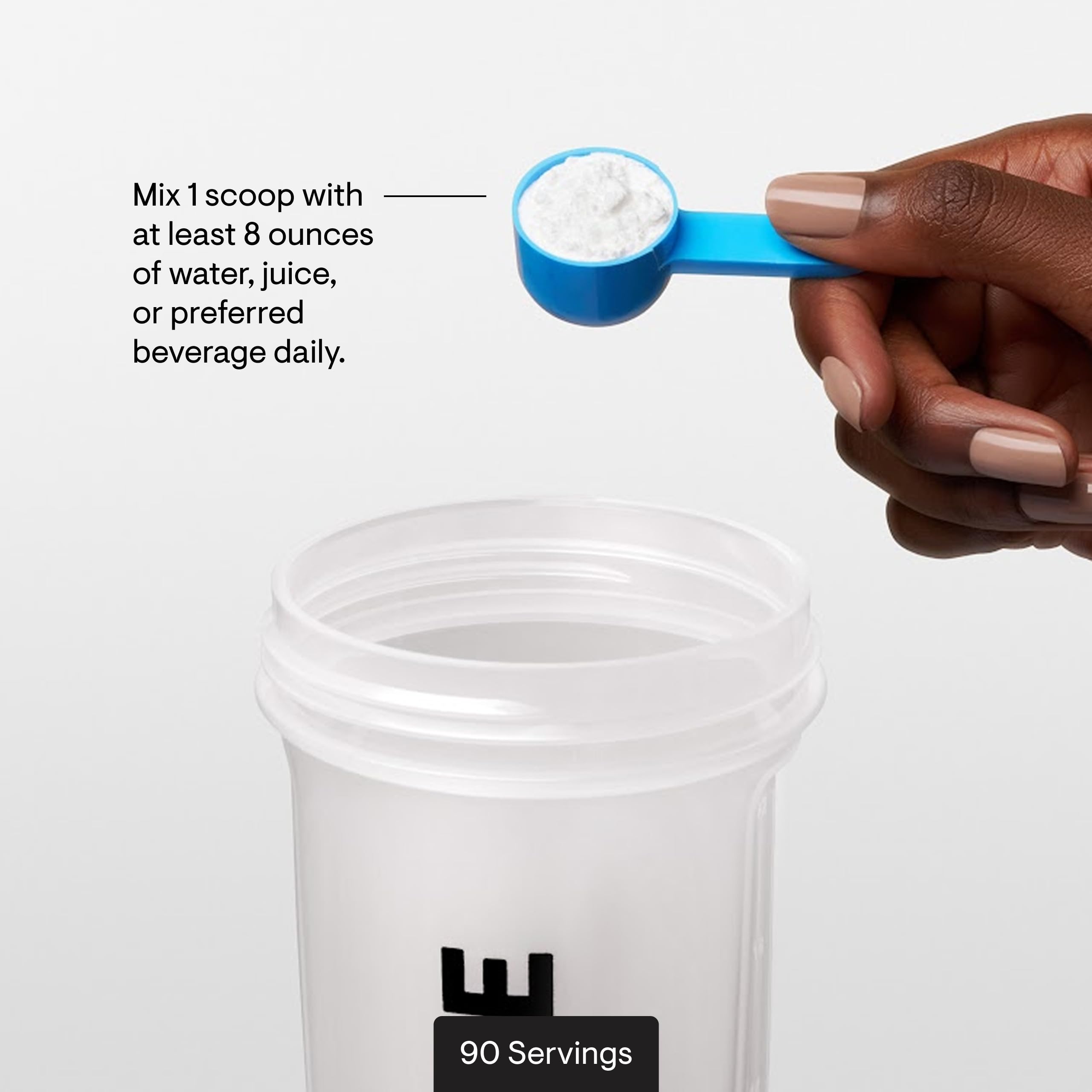 THORNE L-Glutamine powder texture closeup reveals fine granules ideal for smooth mixing.