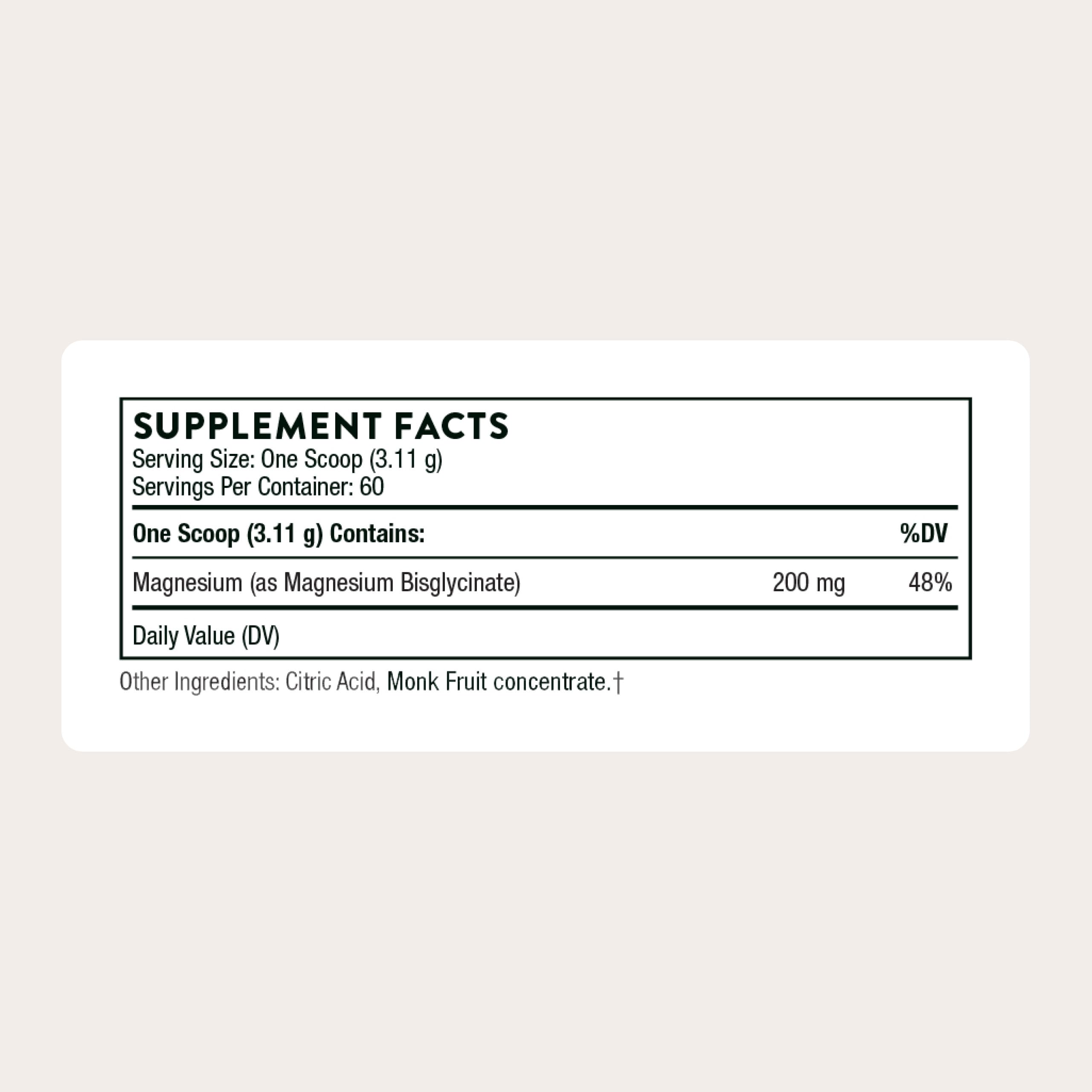 Scoop of Thorne magnesium bisglycinate powder for nightly routine.
