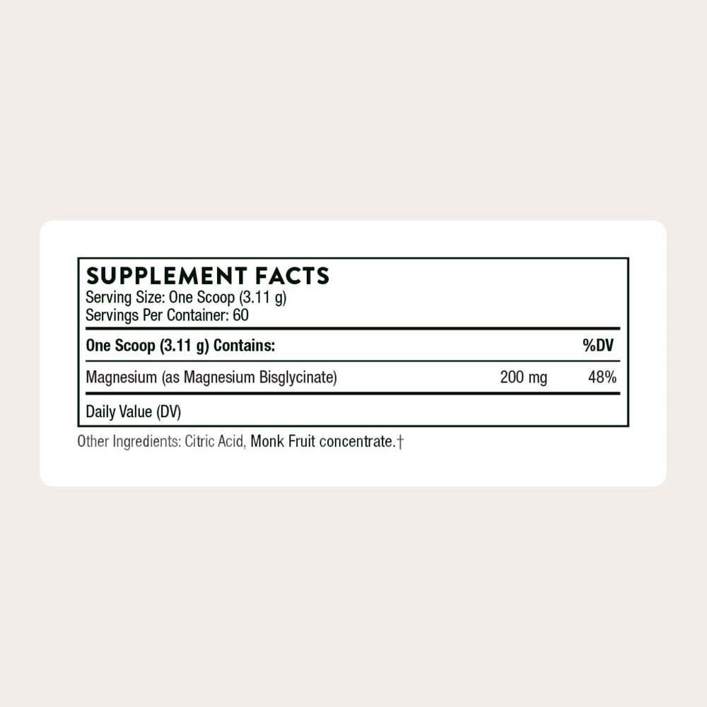 Scoop of Thorne magnesium bisglycinate powder for nightly routine.