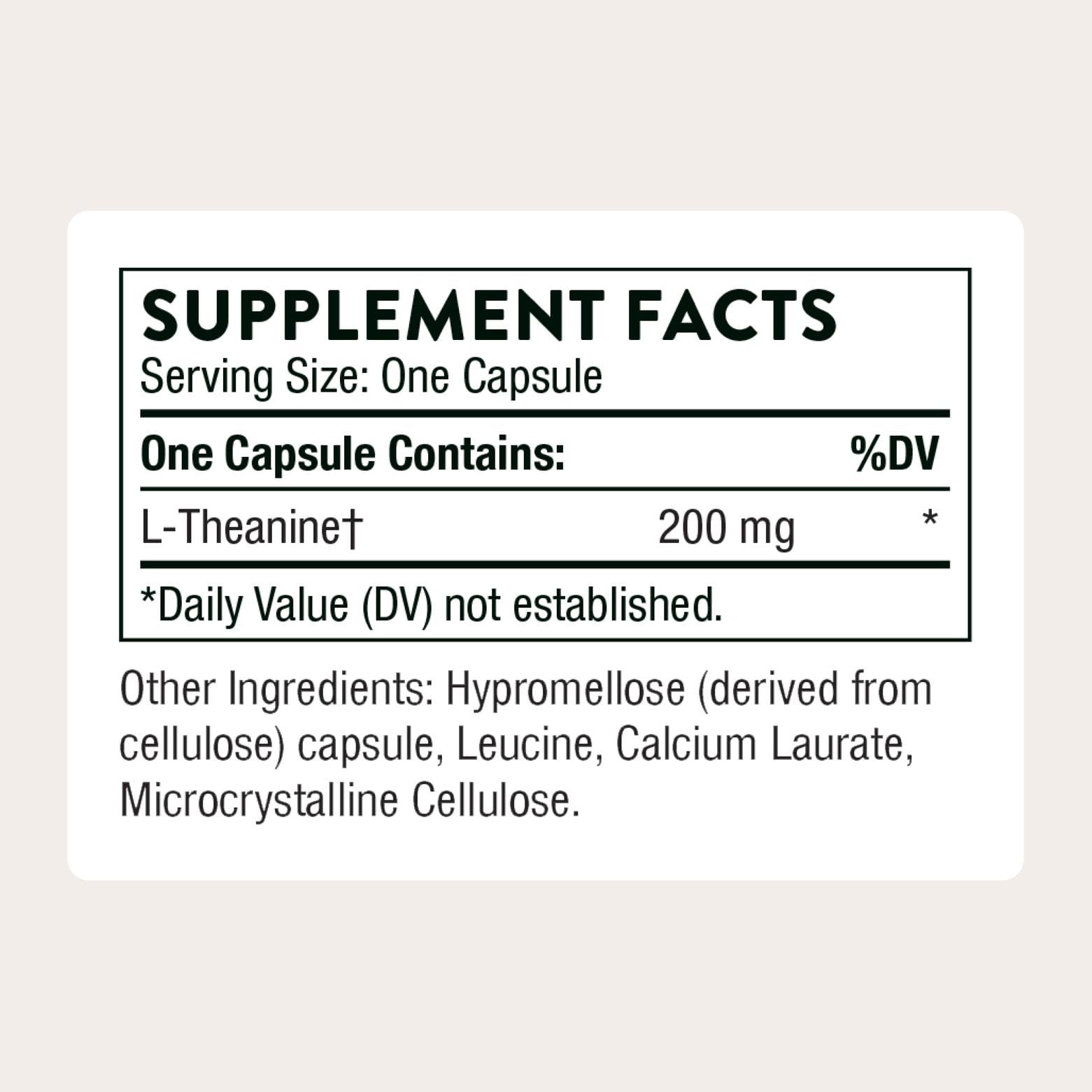 THORNE Theanine capsules in hand signaling calm focus