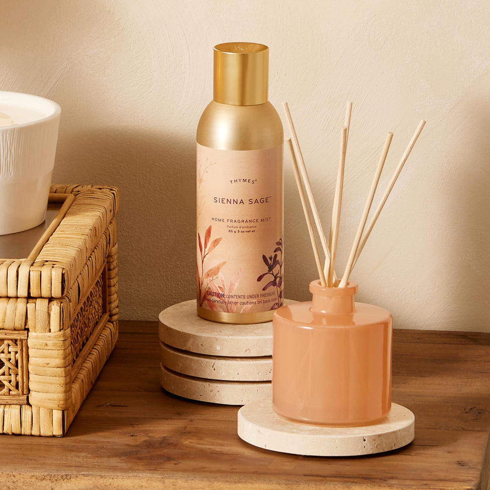 Thymes Sienna Sage mist enhancing living room atmosphere.