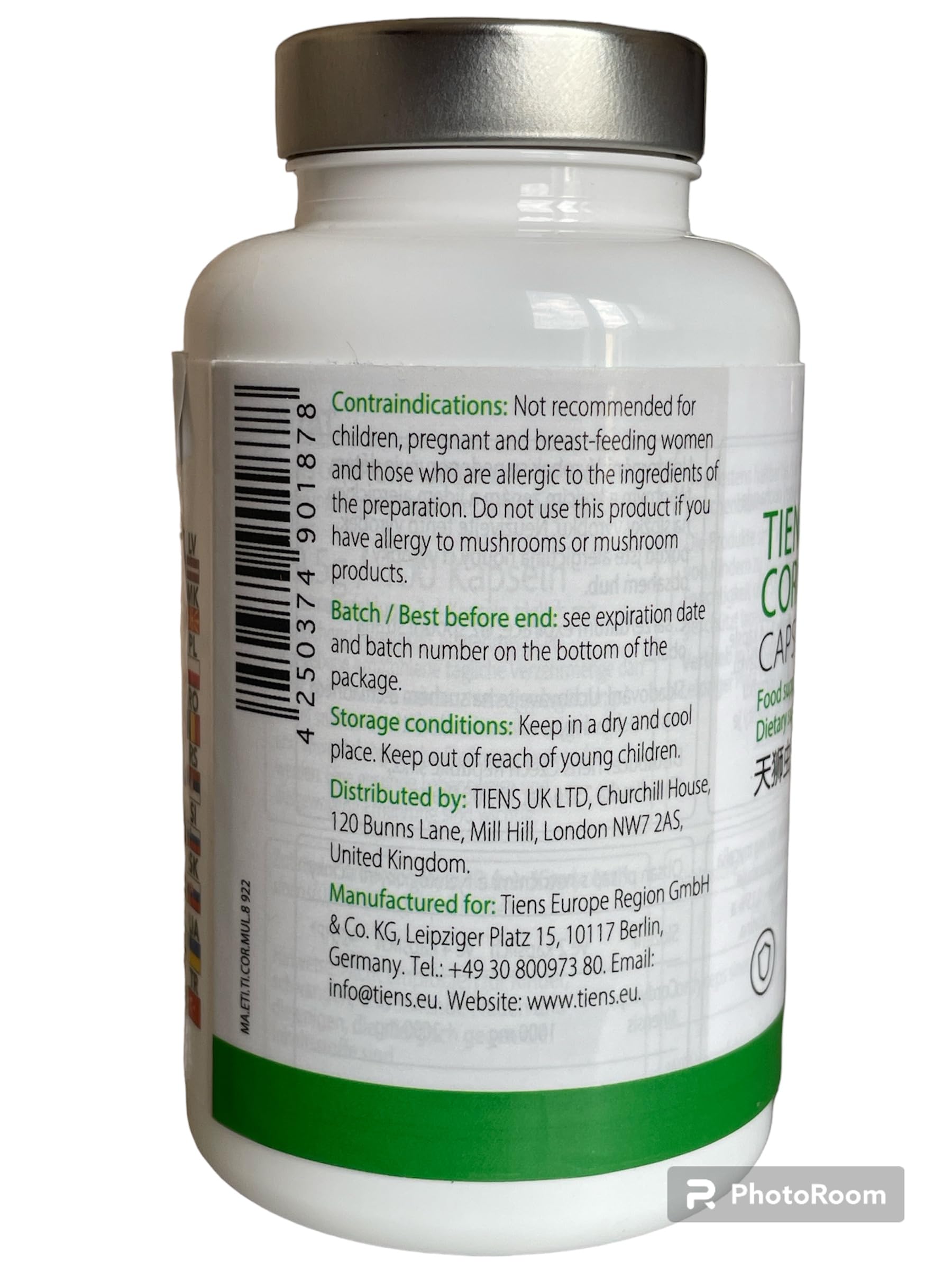 Tiens Cordyceps 100 Capsules capsules spilled on wood suggest easy daily routine.