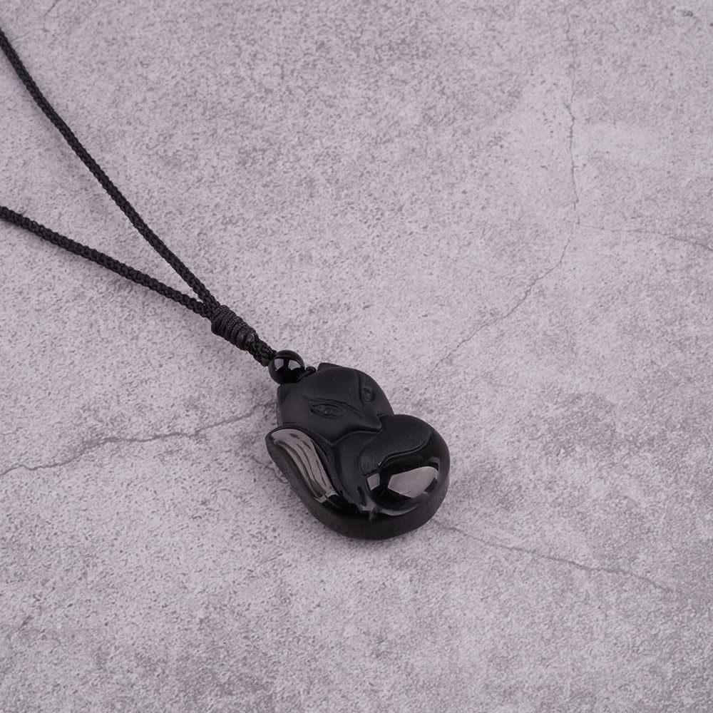TIKCAUZ Black Obsidian Pendant close-up reveals smooth surface and unique grain.