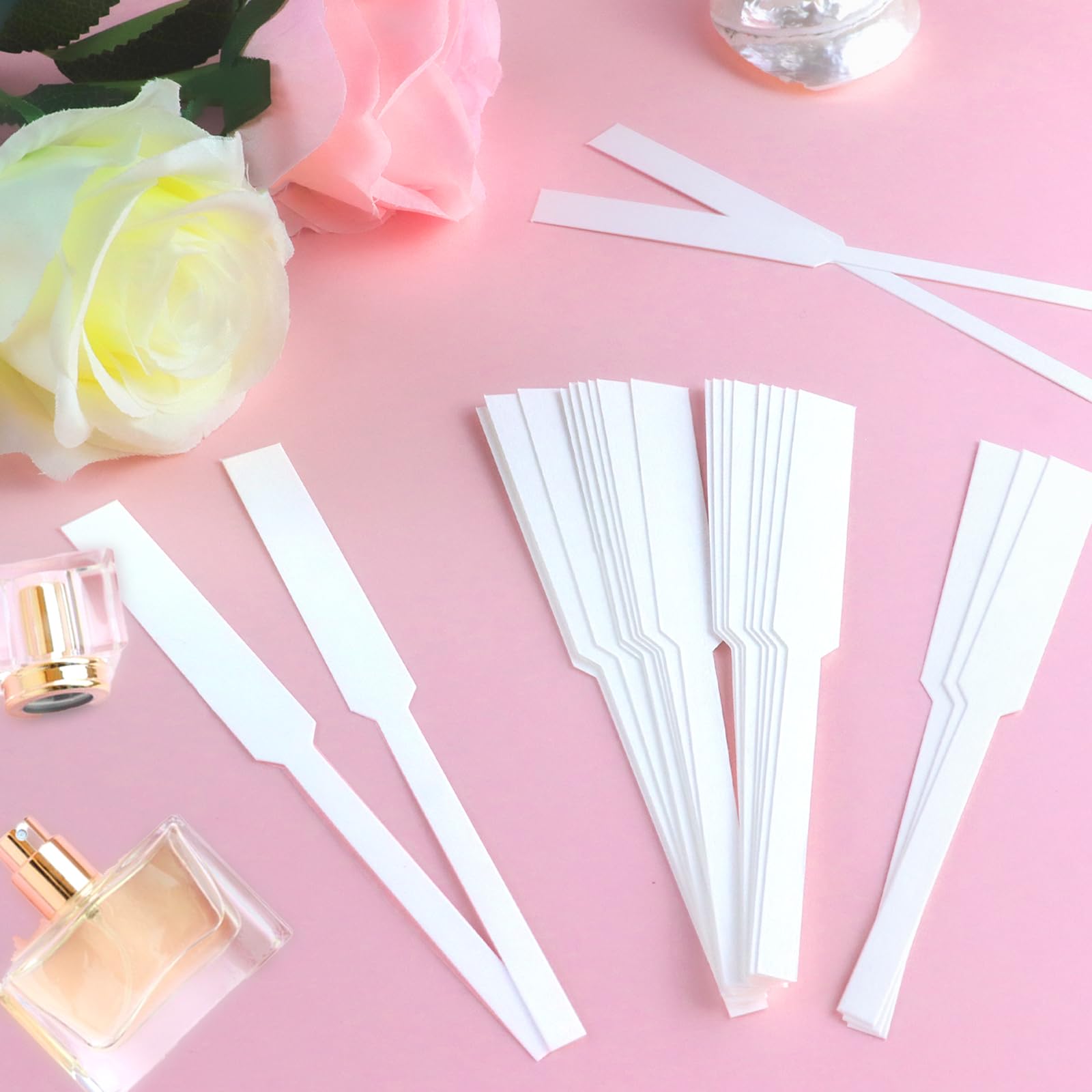 TKYZMS fragrance blotter strips plain white ideal for quick scent comparisons.