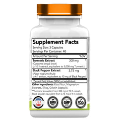 tnvitamins Turmeric Curcumin capsules close-up showing golden color.