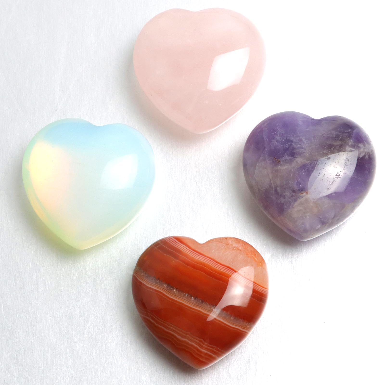 Togous red agate heart stone boosts vitality and courage for daily tasks.